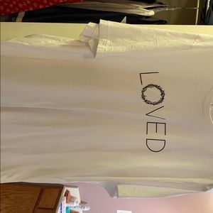 T-shirt with the LOVED written on it